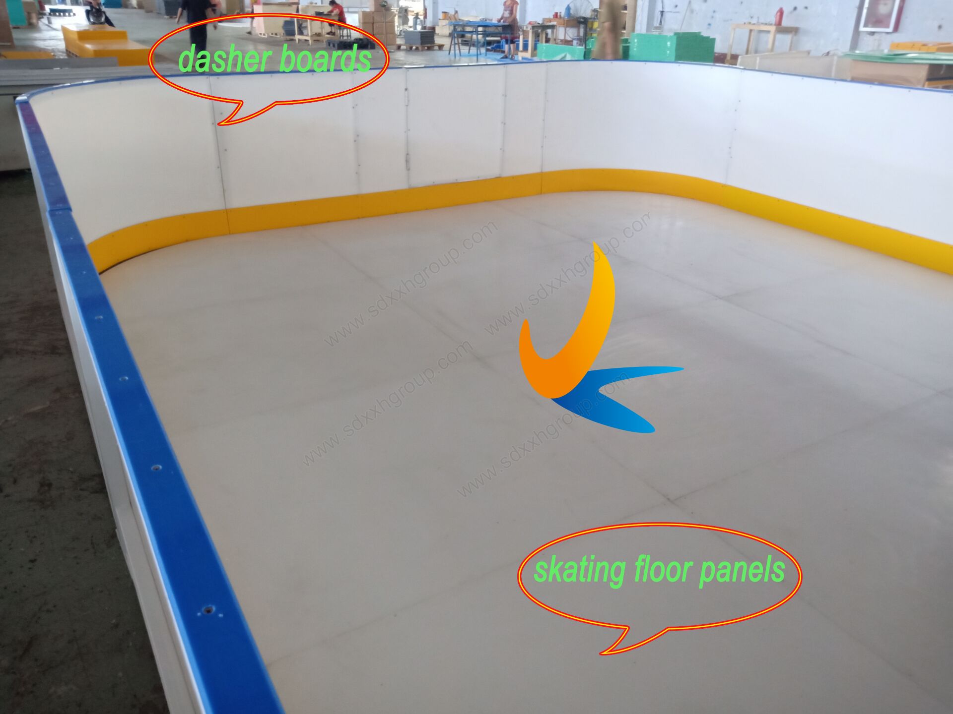 Synthetic ice skating rink system