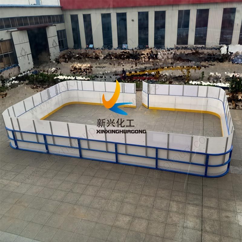 Synthetic ice skating rink system